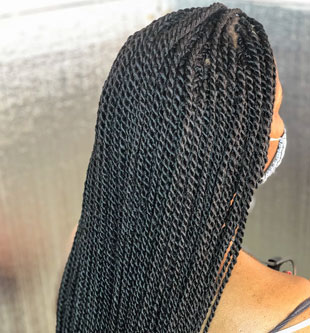 A woman with Sengalese Twist hairstyle